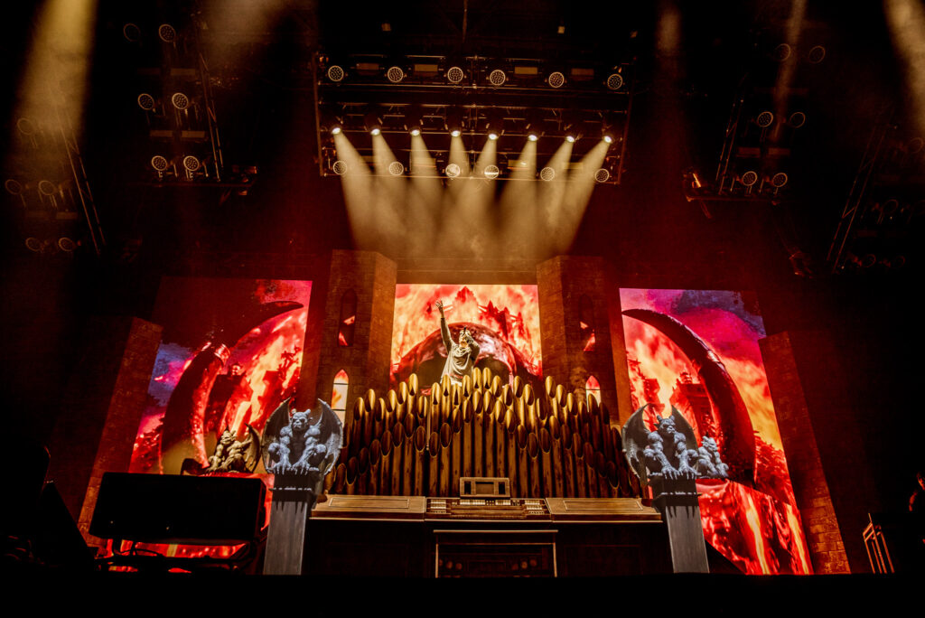 Kid Yugi wide stage shot wth yellow lighting